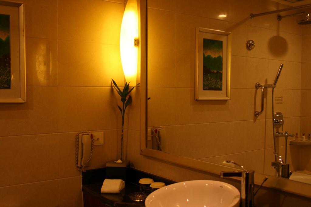 Merryland Traders Hotel Changshu Room photo