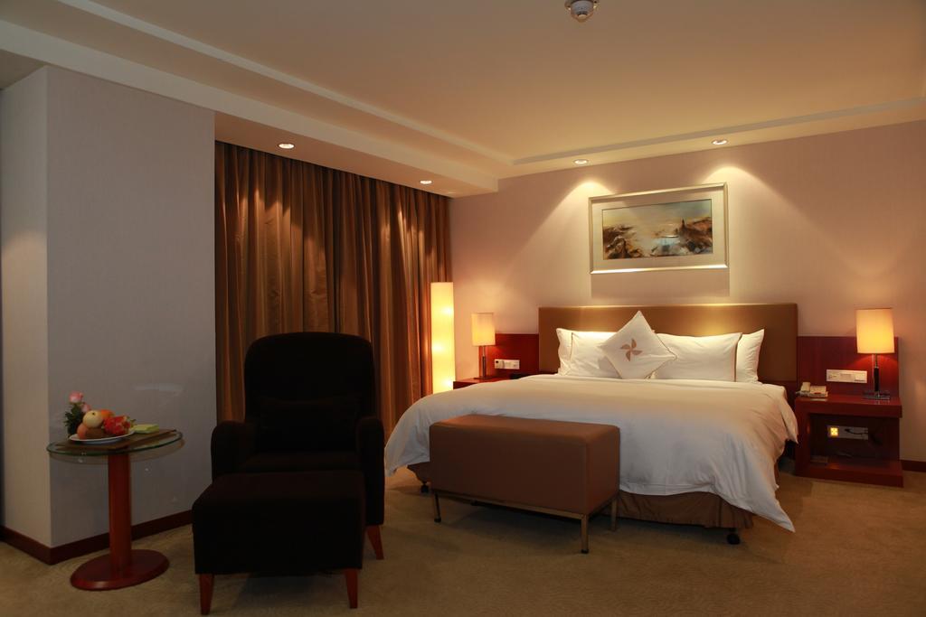 Merryland Traders Hotel Changshu Room photo