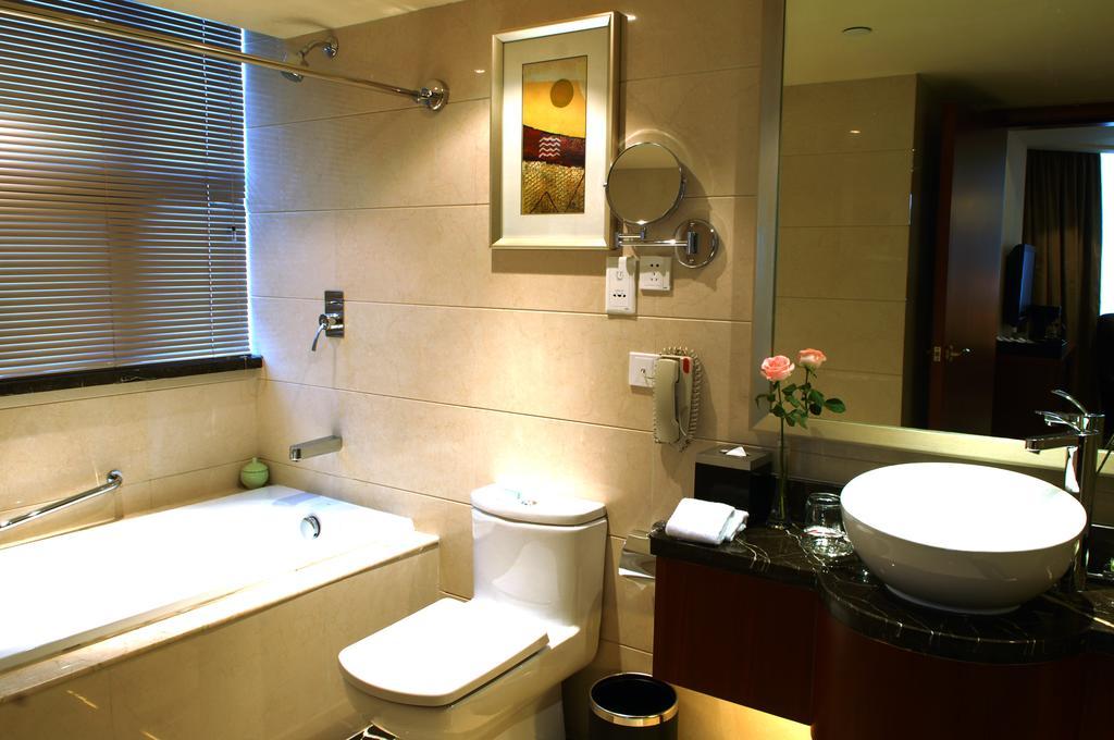 Merryland Traders Hotel Changshu Room photo